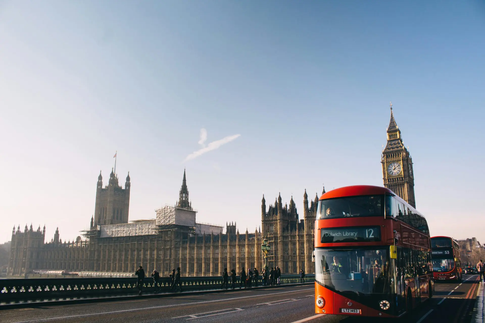 Red bus with Big Ben in the background